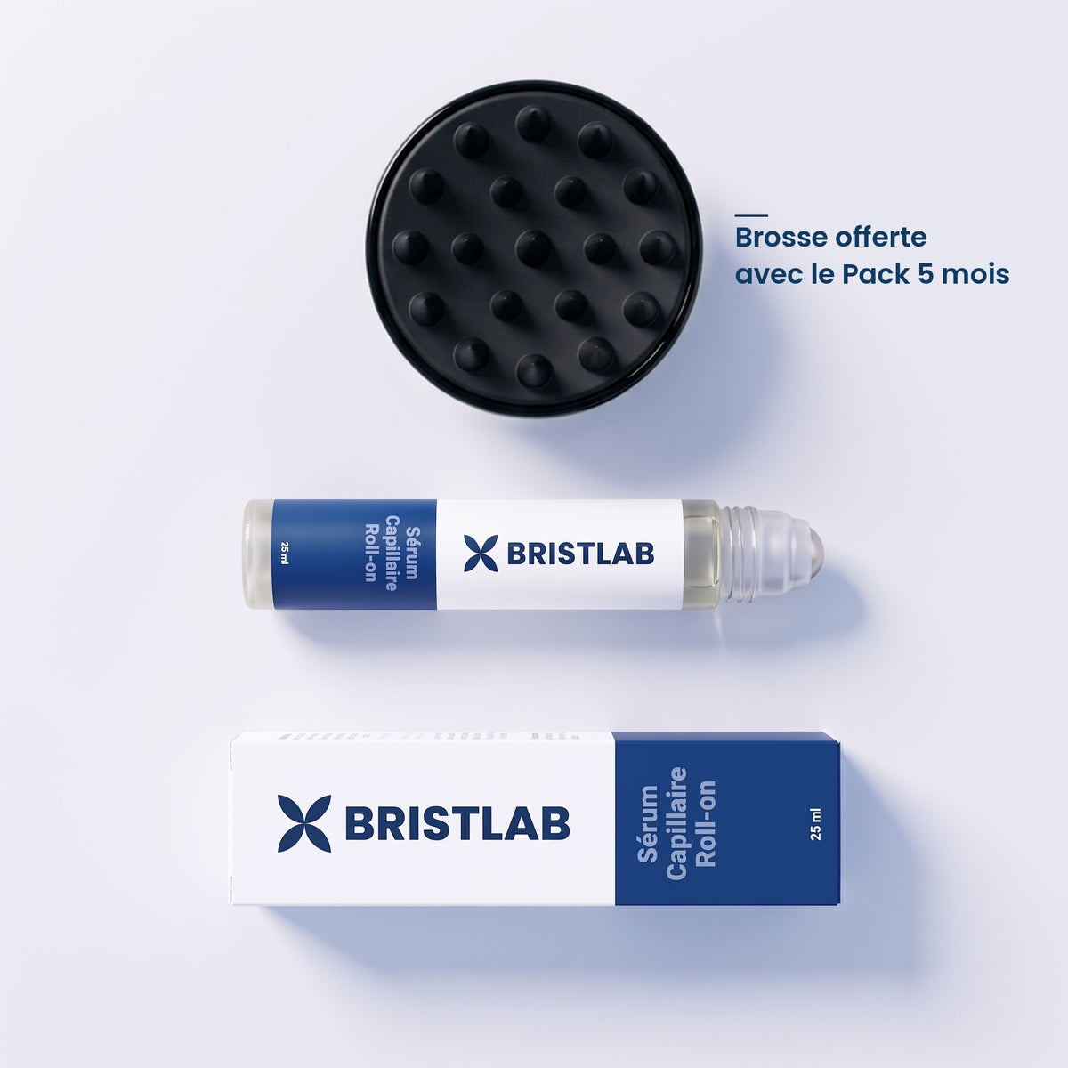 Contenu du Pack 5 mois Bristlab : sérum capillaire roll-on 25 ml, sa boîte et la brosse de massage en silicone offerte