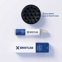 Contenu du Pack 5 mois Bristlab : sérum capillaire roll-on 25 ml, sa boîte et la brosse de massage en silicone offerte